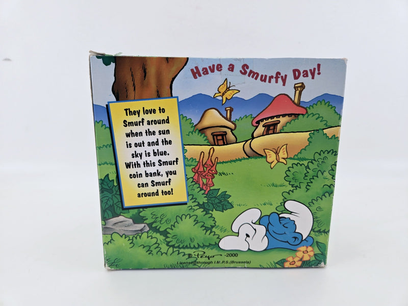 smurf Coin Bank 2000 Peyo piggy bank laying under mushroom