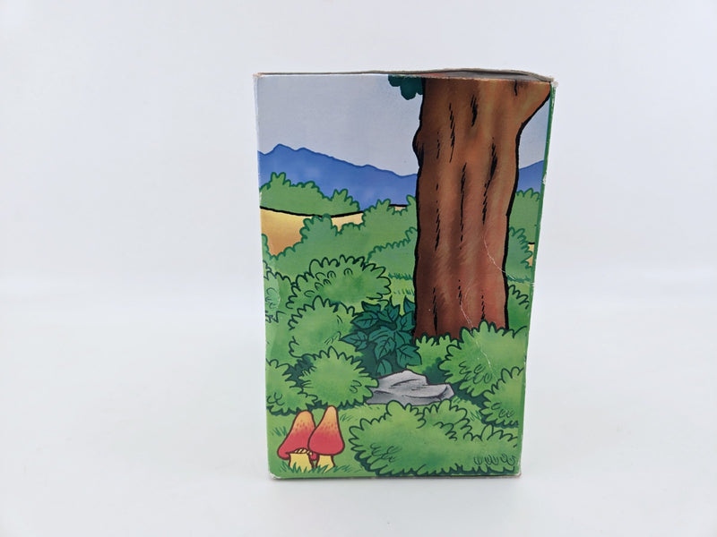 smurf Coin Bank 2000 Peyo piggy bank laying under mushroom